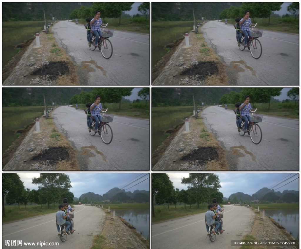 越南街道上骑着自行车的儿童