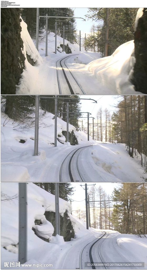 冬季高山被大雪覆盖的铁路