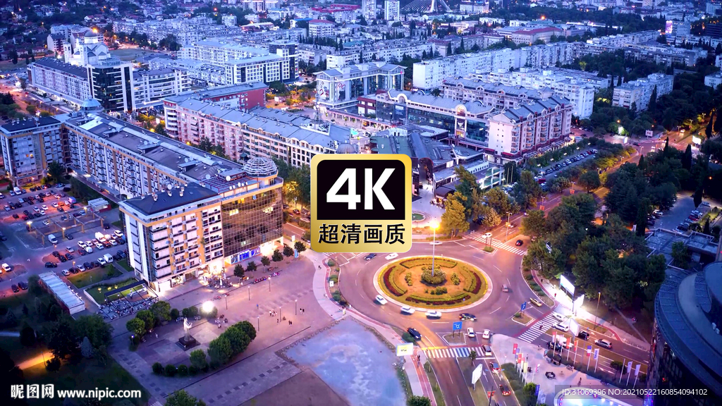 航拍素材城市中心花园穿行的车流