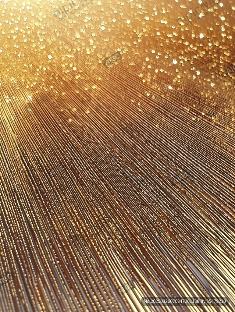 金色闪耀光芒纹理背景图