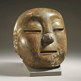 戴金面罩铜人头像