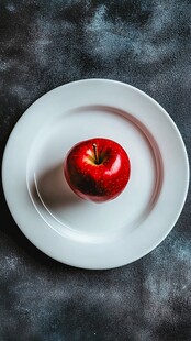 盘中苹果暖色背景