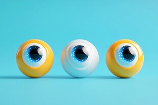 多彩眼球在蓝色背景中摇曳