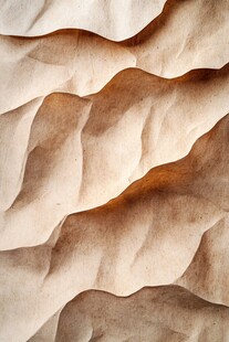 皱褶的米色纸张纹理