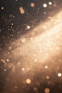 金色粒子在黑暗背景中浮动