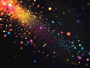 多彩粒子在黑暗背景中流动