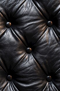 黑色皮革纹理与钮扣