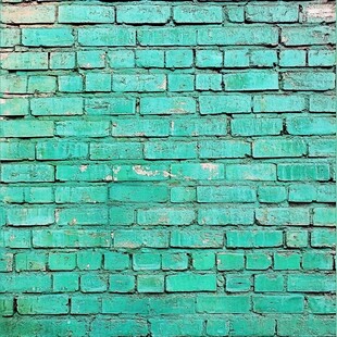 绿色砖墙的纹理和风化