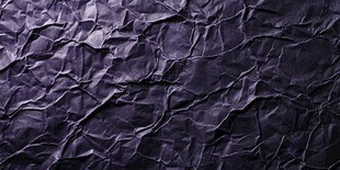 皱褶的紫色纸张纹理