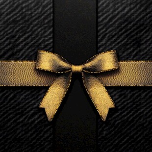 黑色礼盒上的金色蝴蝶结