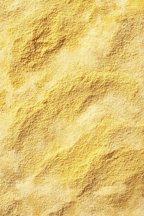 金黄细腻玉米粉纹理特写