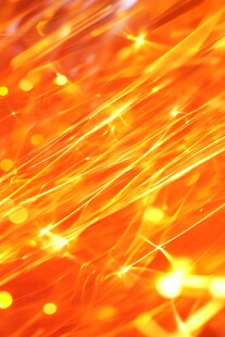 梦幻橙光闪烁光芒背景图