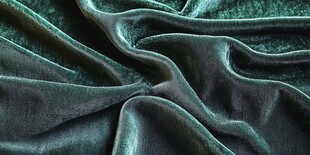 深绿色绒面布料纹理特写