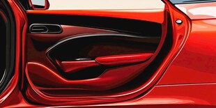 红色汽车车门内饰特写