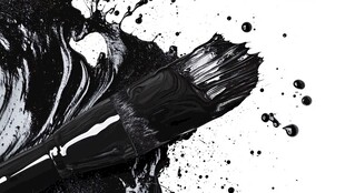黑色画笔与飞溅颜料