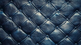 深蓝色菱形绗缝皮革纹理