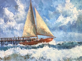 帆船在海浪中驶向码头