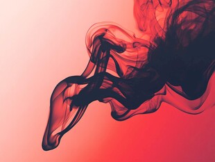 红色背景中舞动的黑色墨韵