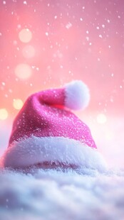 粉色圣诞帽置于雪境中