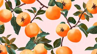 粉色背景上的柿子与绿叶图案