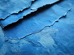 蓝色纹理破旧纸张特写