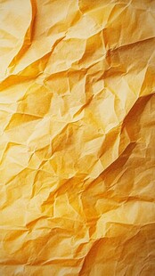 皱巴巴的黄色纸张纹理
