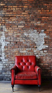 复古红皮椅配砖墙背景