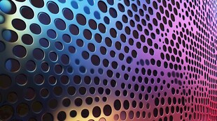 梦幻渐变穿孔金属纹理背景