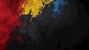 多彩颜料泼洒黑色背景