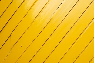 黄色斜纹木板墙面纹理