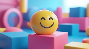 微笑表情球置于多彩积木间