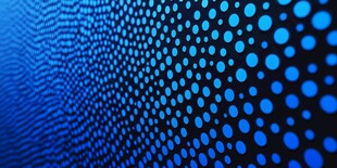 蓝色点阵纹理背景图