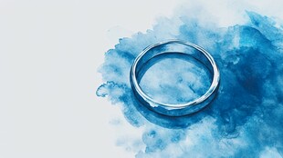 蓝色水彩背景中的简约戒指