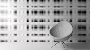 现代简约风单椅与穿孔墙