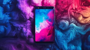 绚丽背景中的时尚智能手机