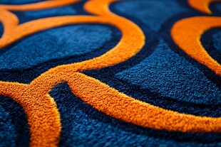 蓝橙交织地毯纹理特写