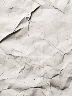 褶皱白纸纹理背景图