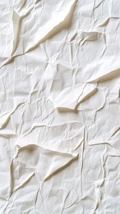 白色褶皱纸张纹理特写