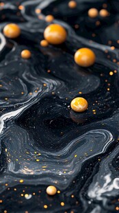 黑金流体上的金色圆珠