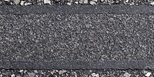 黑色沥青路面纹理特写