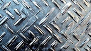金属菱形花纹板纹理特写