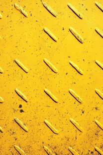 黄色防滑金属板纹理特写