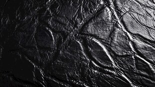 黑色皮革纹理特写