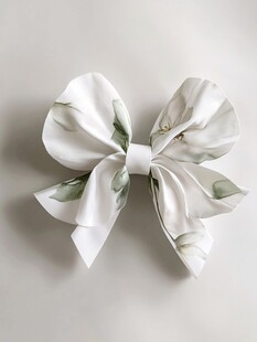白色花卉图案蝴蝶结发饰
