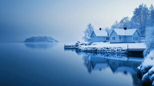 冬日湖畔雪景中的静谧小屋