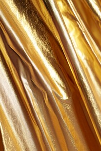 金色光泽褶皱布料纹理