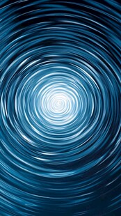 蓝色同心波纹抽象背景图