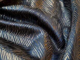 蓝底金纹绸缎面料特写