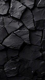 黑色碎石墙面纹理特写