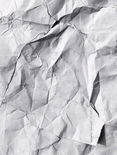 皱巴巴的纸张纹理特写